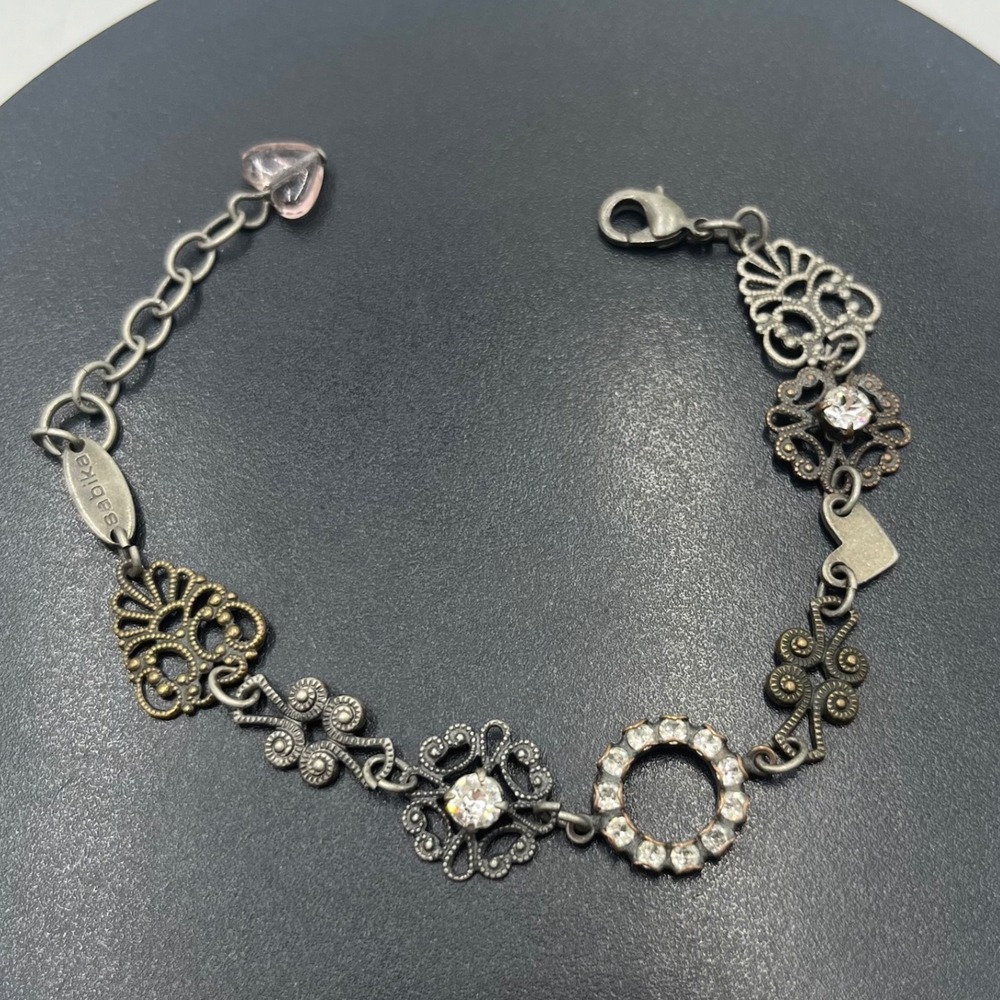 Sabika multi-charm mixed metal flower bracelet Winter 2015 (W15) collection
